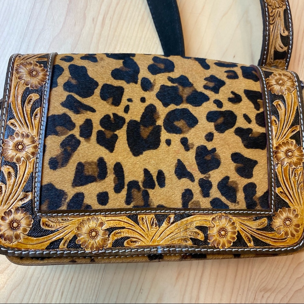 Beautiful hand tooled leather and cowhide bag